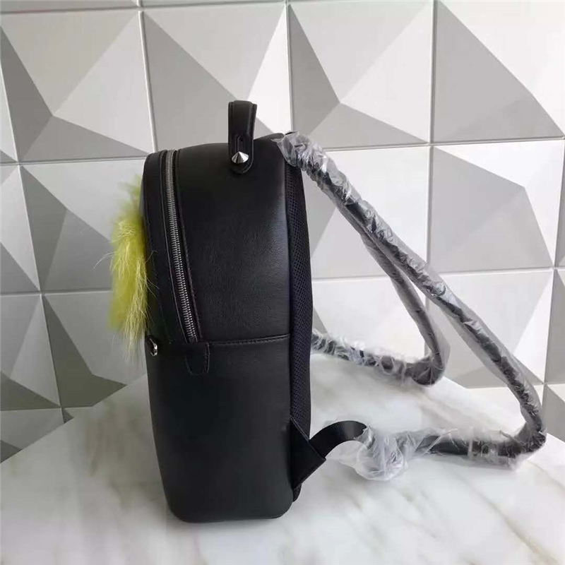 FENDI/芬迪 走秀新款 小怪獸黃毛毛大眼睛鉚釘 雙肩包 黑色