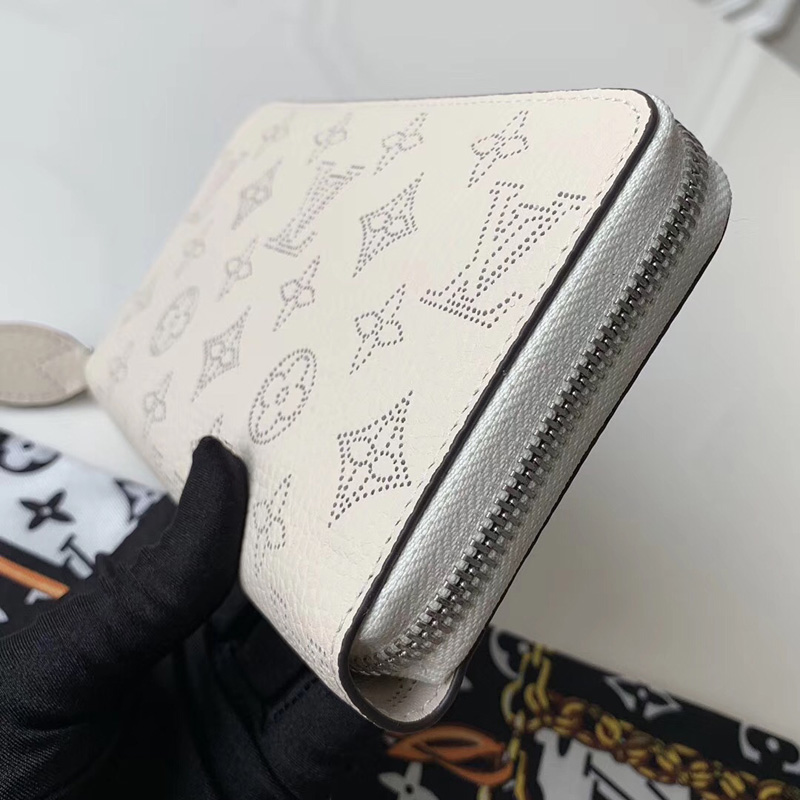 M61869 LV Zippy 拉鏈錢夾 Monogram鏤孔花紋錢包 象牙白