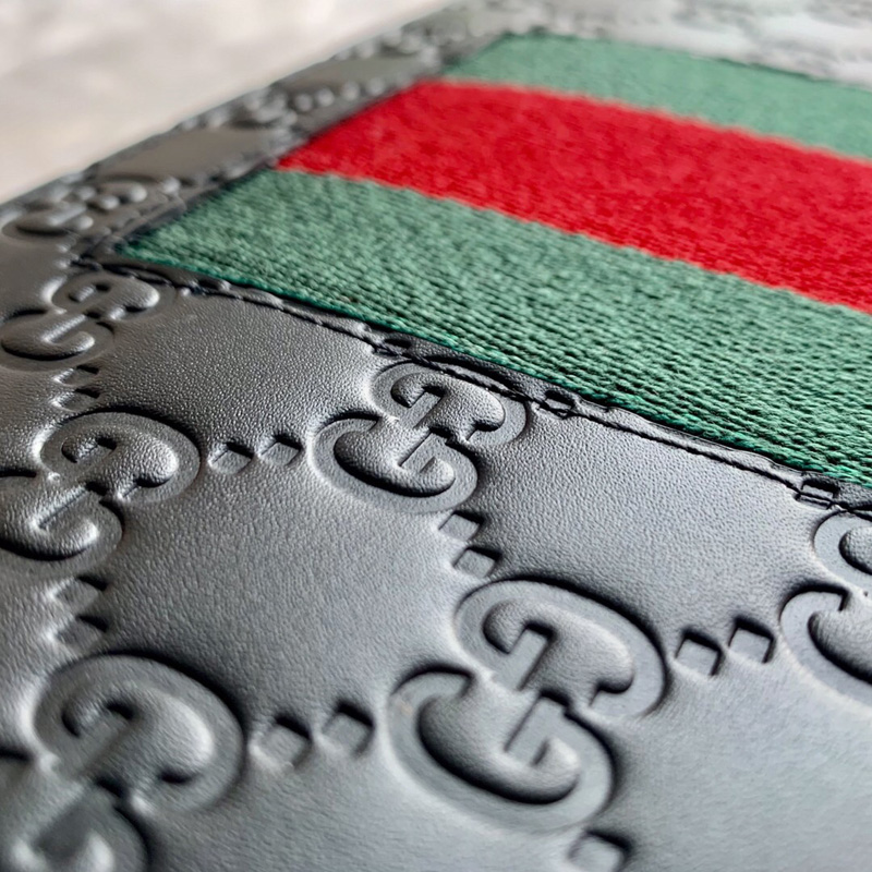 475316 Gucci古馳Signature材質(zhì)壓花手拿包 Gucci手拿包 黑色